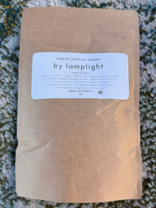by lamplight loose leaf tea - marginnotesPackage with a label on a textured surface