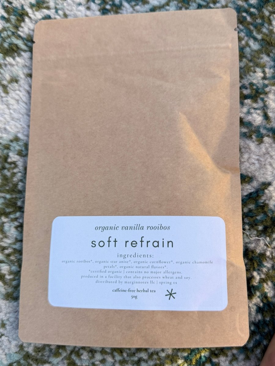 soft refrain loose leaf tea - marginnotesKraft paper package with a label on a textured surface